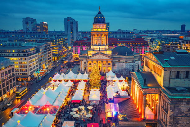 Christmas market in Berlin Christmas market, Deutscher Dom and konzerthaus in Berlin, Germany berlin christmas market stock pictures, royalty-free photos & images