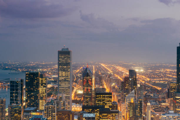 istock Urban Chicago Night View of Downtown Loop Buildings 868695572
