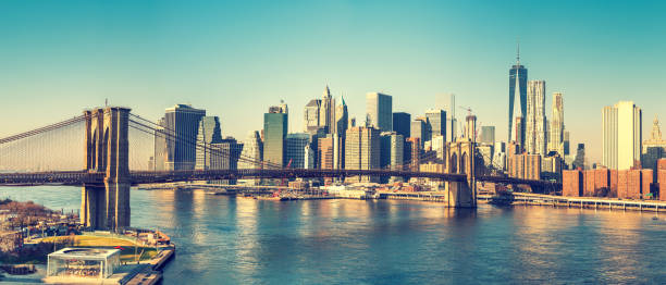 istock Brooklyn bridge and Manhattan at sunny day 868696002