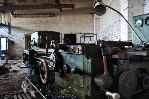 istock Old industrial machine tool. Rusty metal equipment in abandoned factory 868697396