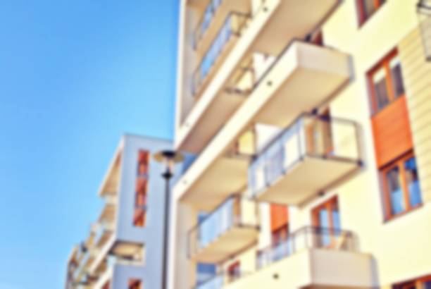 istock Abstract blur of modern apartment building. 868702274