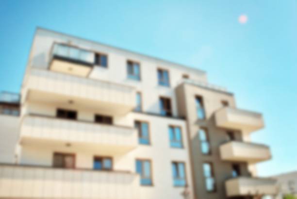 istock Abstract blur of modern apartment building. 868704922