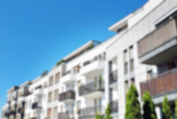 istock Abstract blur of modern apartment building. 868704938
