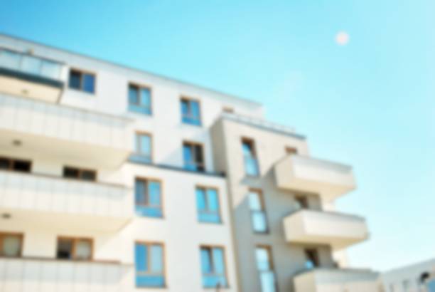 istock Abstract blur of modern apartment building. 868707040
