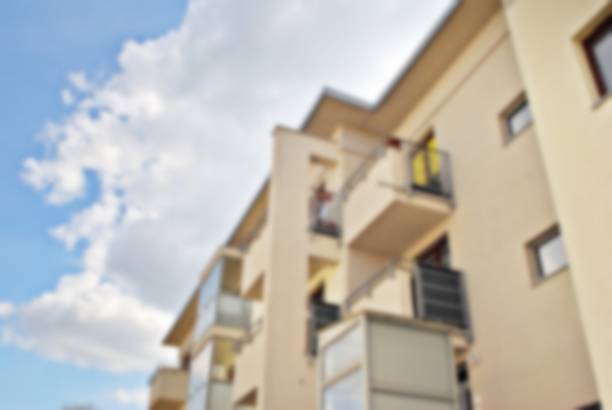 istock Abstract blur of modern apartment building. 868708152