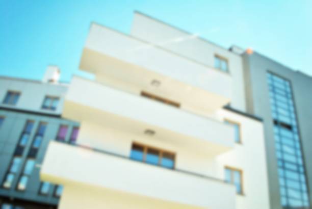 istock Abstract blur of modern apartment building. 868710806