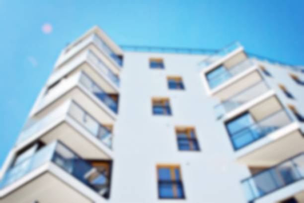 istock Abstract blur of modern apartment building. 868711460