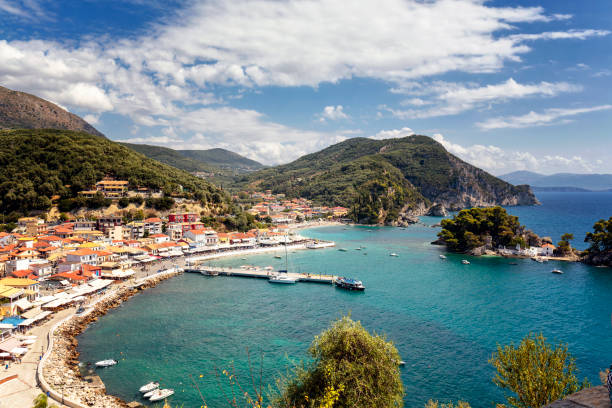 Aerial view of the harbor and city of Parga, Epirus, Greece Aerial view of the harbor and city of Parga, Epirus, Greece parga greece stock pictures, royalty-free photos & images