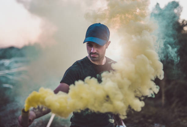 istock Man holding flaming torch 868720804