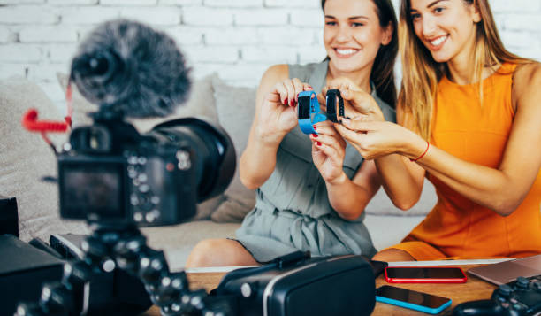 istock Two women reviewing smart watches 868727710