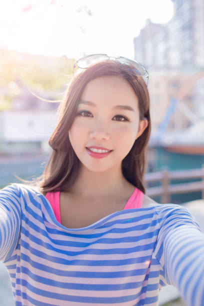 istock woman selfie happily 868734052