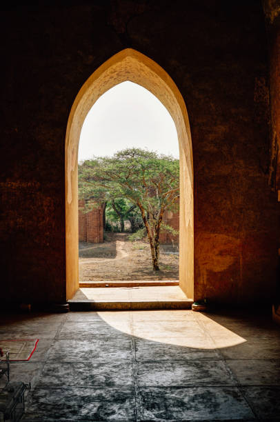 istock View through an archway towards a tree in Bagan Myanmbar Burma 868737568