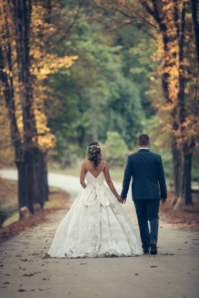 istock Wedding couple in nature 868743384
