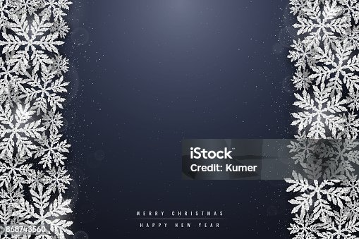 istock Christmas silver glittering snowflakes background 868743560