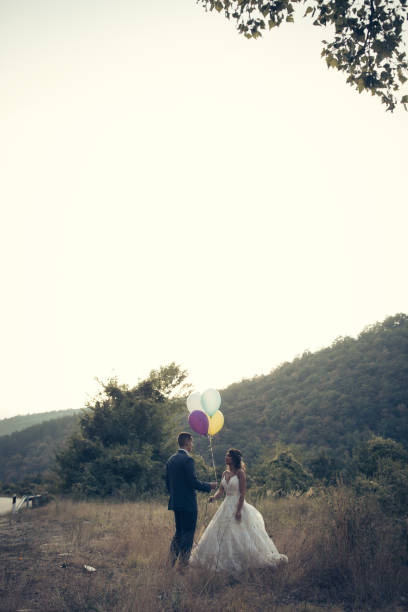 istock Wedding couple in nature 868744596