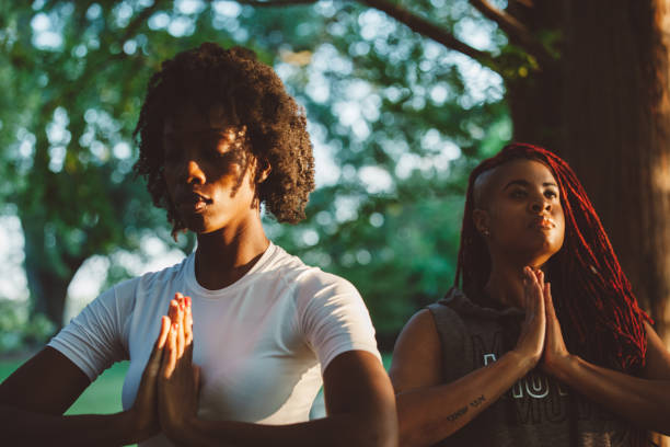 istock meditative yoga at the park 868755802