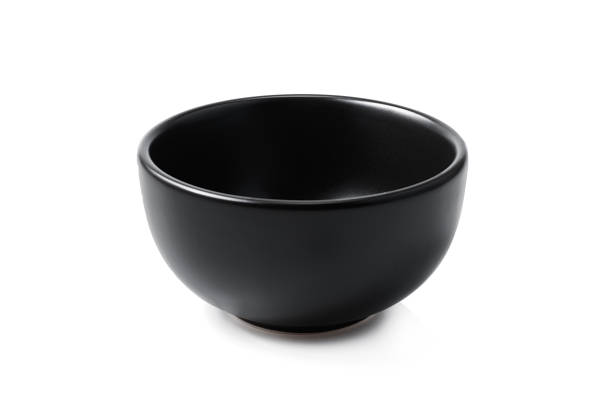 istock Close-up of a black bowl, Empty black bowl isolated on white background 868765516