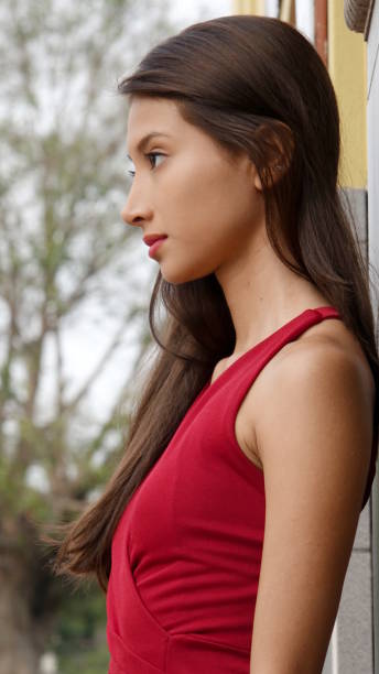 istock Hispanic Girl And Sadness 868769996