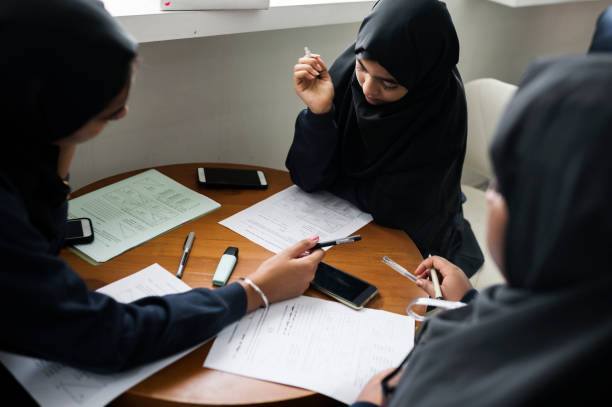 istock diverse muslim girls studying in classroom 868776066