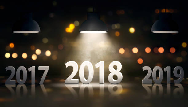Happy New Year 2018 2018 number between 2017 & 2019 with light of the lampt. Happy New Year 2018 2018 stock pictures, royalty-free photos & images
