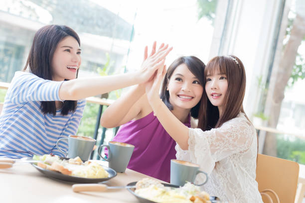 happy woman friends in restaurant - coffee time restaurant imagens e fotografias de stock