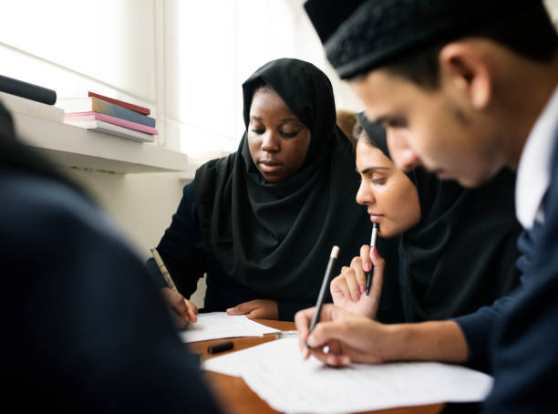 istock Diverse Muslim children studying in classroom 868785318