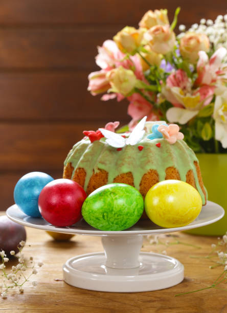 istock Easter symbols food - Easter cake and painted eggs 868789792