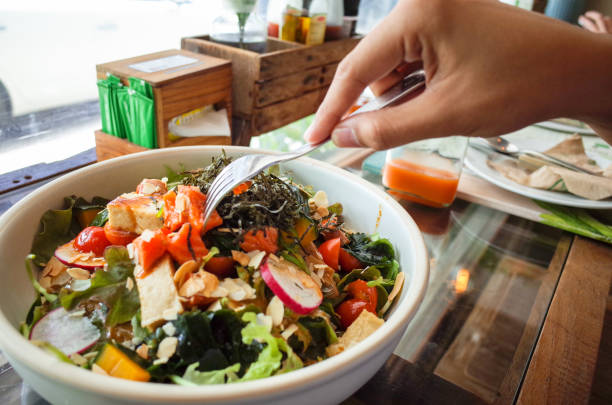 istock mix vegetable , salmon salad close up 868792184