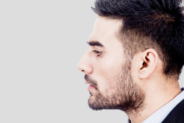 istock Portrait of handsome man on gray background 868797082