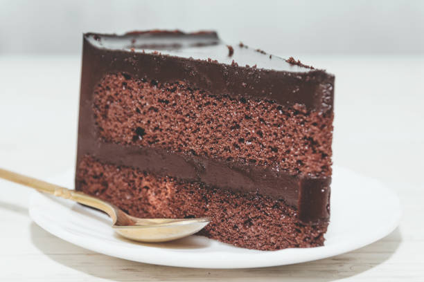 istock Chocolate cake on wooden table 868803958