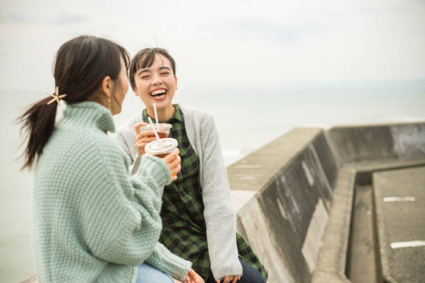 istock They take a sandwich lunch at the beachfront parking lot. . 868808384