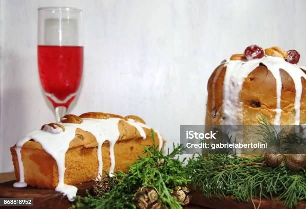 Sweet Bread Christmas Pudding Cin Dried And Glazed Fruits And Sparkling Beverages Stock Photo - Download Image Now