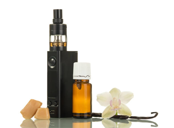 istock Fluid for smoking with vanilla scent and electronic cigarette isolated on white 868821694