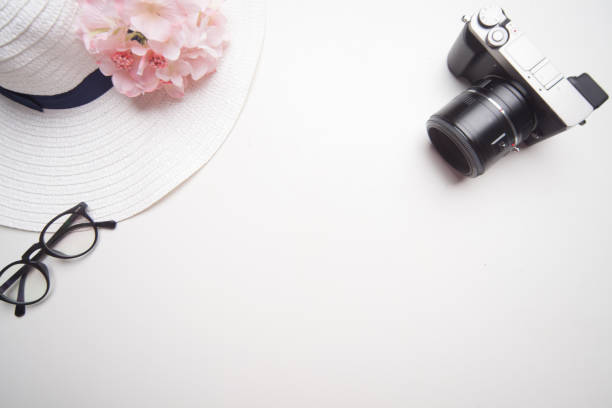 istock camera with hat on top of the table 868826958