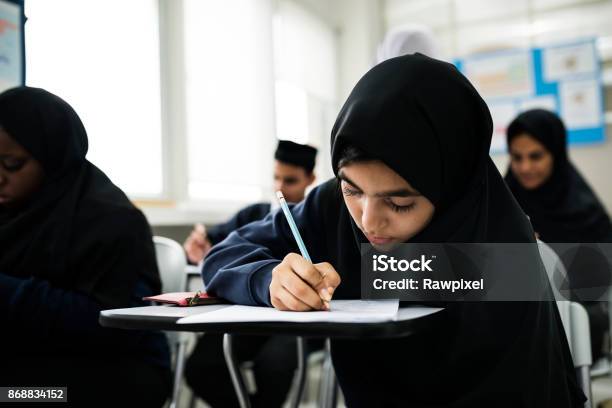 Muslim Children Studying In Classroom Stock Photo - Download Image Now - Education, Islam, Student