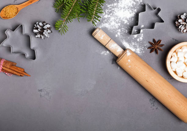 istock Ingredients for Christmas cooking and fir branches on grey background 868844482