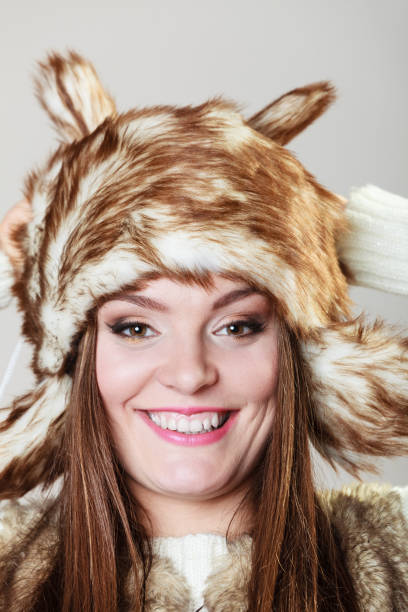 istock Attractive woman in fur cap 868845074