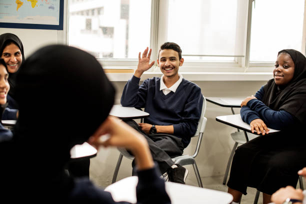 istock diverse muslim children studying in classroom 868845514