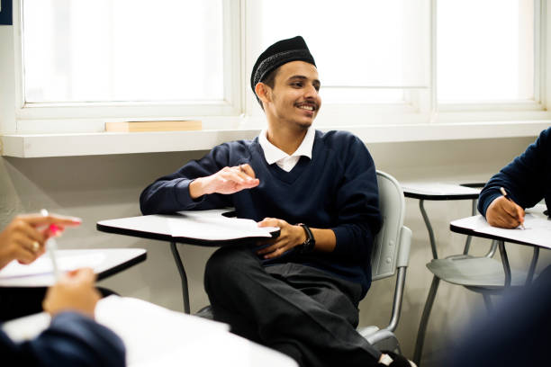 istock diverse muslim children studying in classroom 868847674
