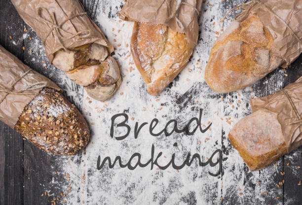 istock Bakery concept background. Bread sorts on flour 868848058