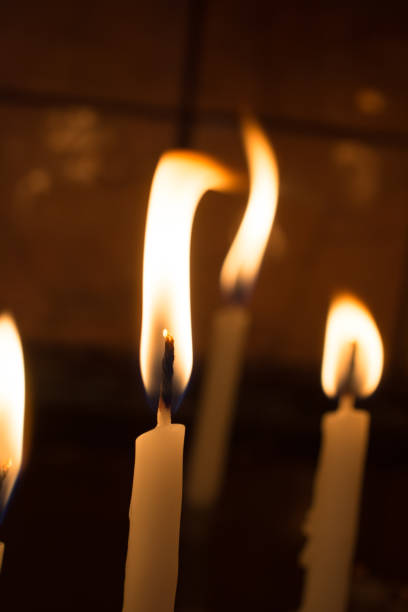 istock Burning candles give light in the dark 868849092
