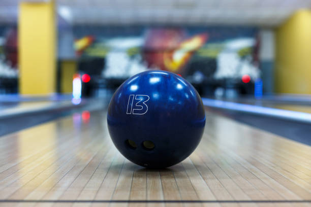 istock Bowling ball closeup on lane background 868853052