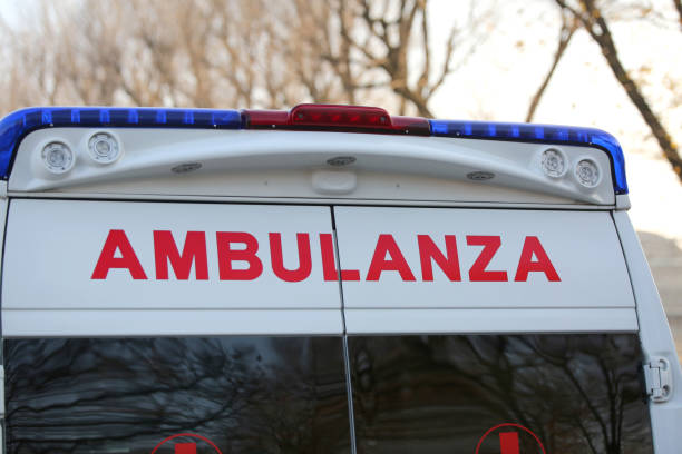 van for medical assistance with the text AMBULANZA that meaning van for medical assistance with the text AMBULANZA that meaning ambulance in Italian language emilia romagna photos stock pictures, royalty-free photos & images