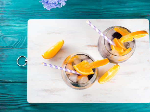 istock Drink with blackberries and orange, ice 868857208
