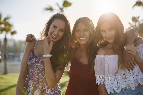 istock Three pretty women standing together smiling 868857276