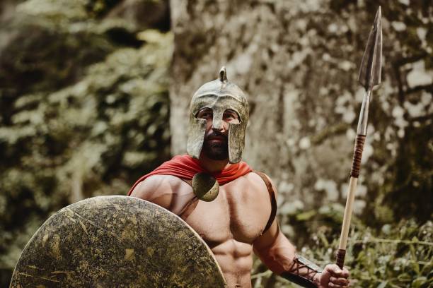 istock Bearded severe warrior in gladiator outfit 868864284