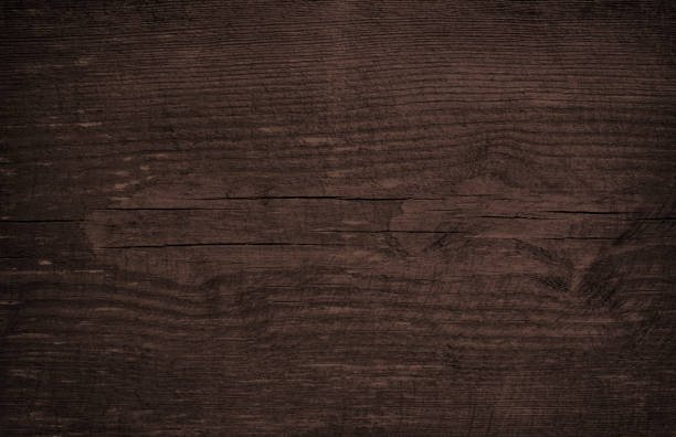 istock Brown scratched wooden cutting board. 868871806