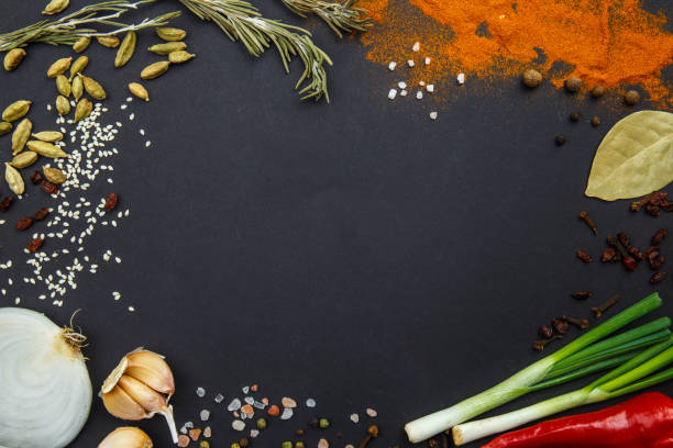 istock On a black background spices and vegetables. View from above. 868872206