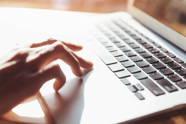 istock Working at home with laptop computer woman writing a blog 868873138