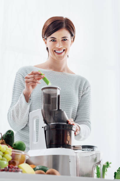 istock Woman preparing a detox drink 868873358